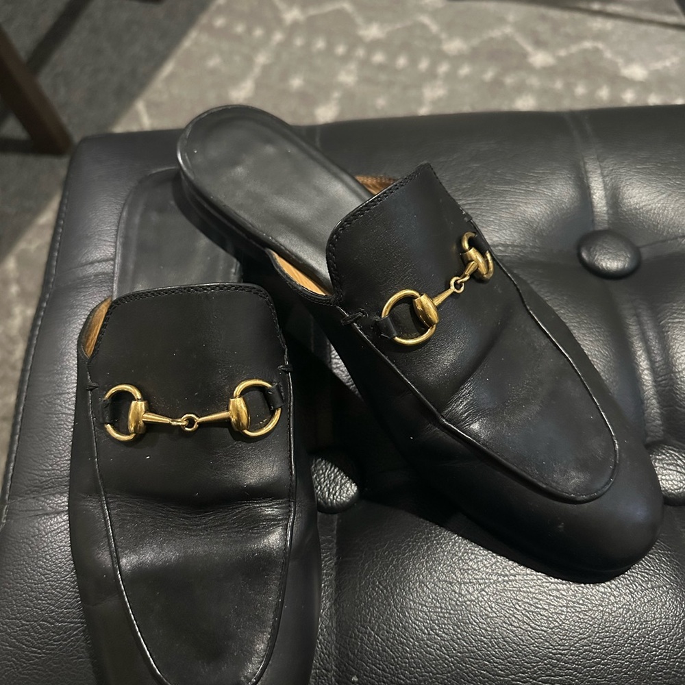 Black Gucci loafers.. used in good condition replaced bottom shoe sole